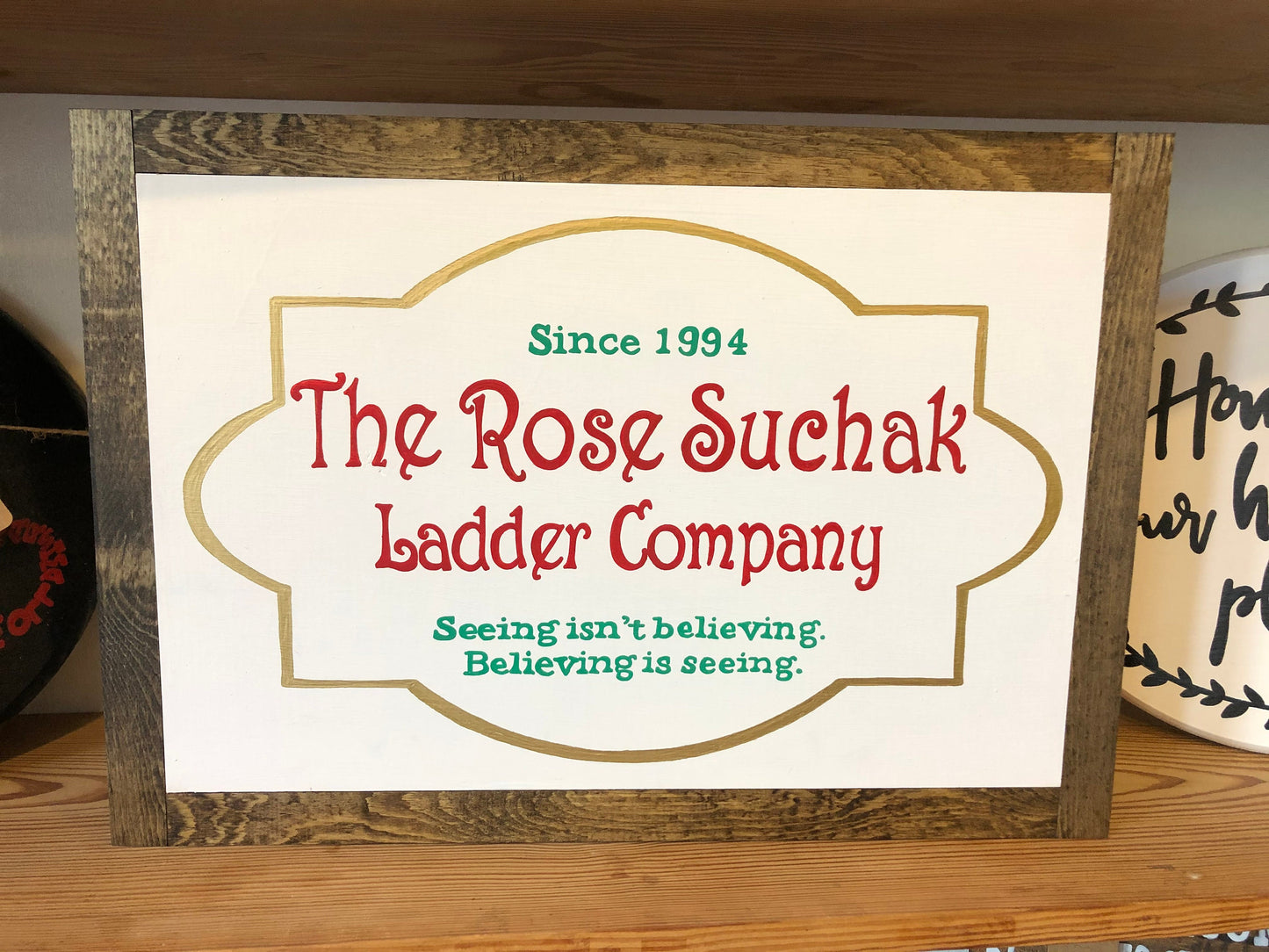 The Rose Suchak Ladder Co. Christmas Sign Framed in a Farmhouse Style