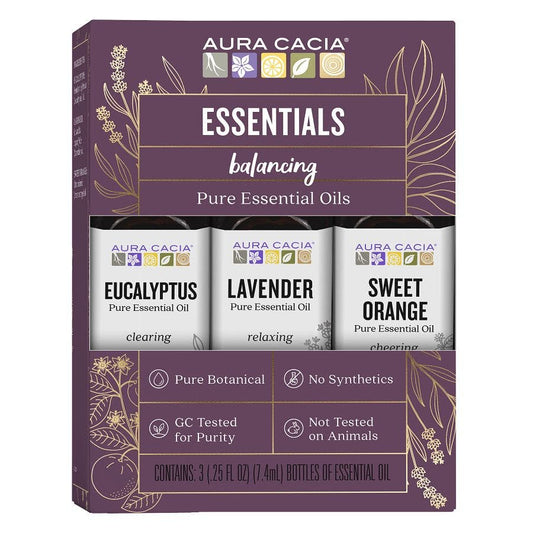 Aura Cacia Essentials Kit with Eucalyptus, Lavender, and Sweet Orange bottles in a purple box.