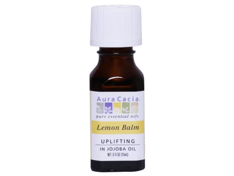 Aura Cacia Lemon Balm in Jojoba Oil 0.5 fl oz, labeled bottle.
